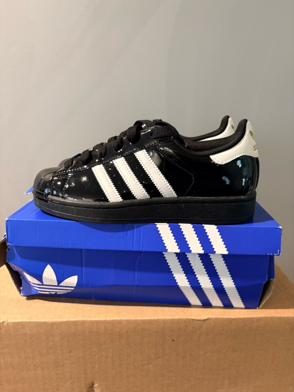 adidas Black and White Patent Leather Low-Top Sneakers